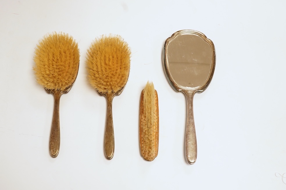 A George V silver and blue guilloche enamel four piece mirror and brush set, Adie Bros. Birmingham, 1935, mirror 28.8cm. Condition - poor